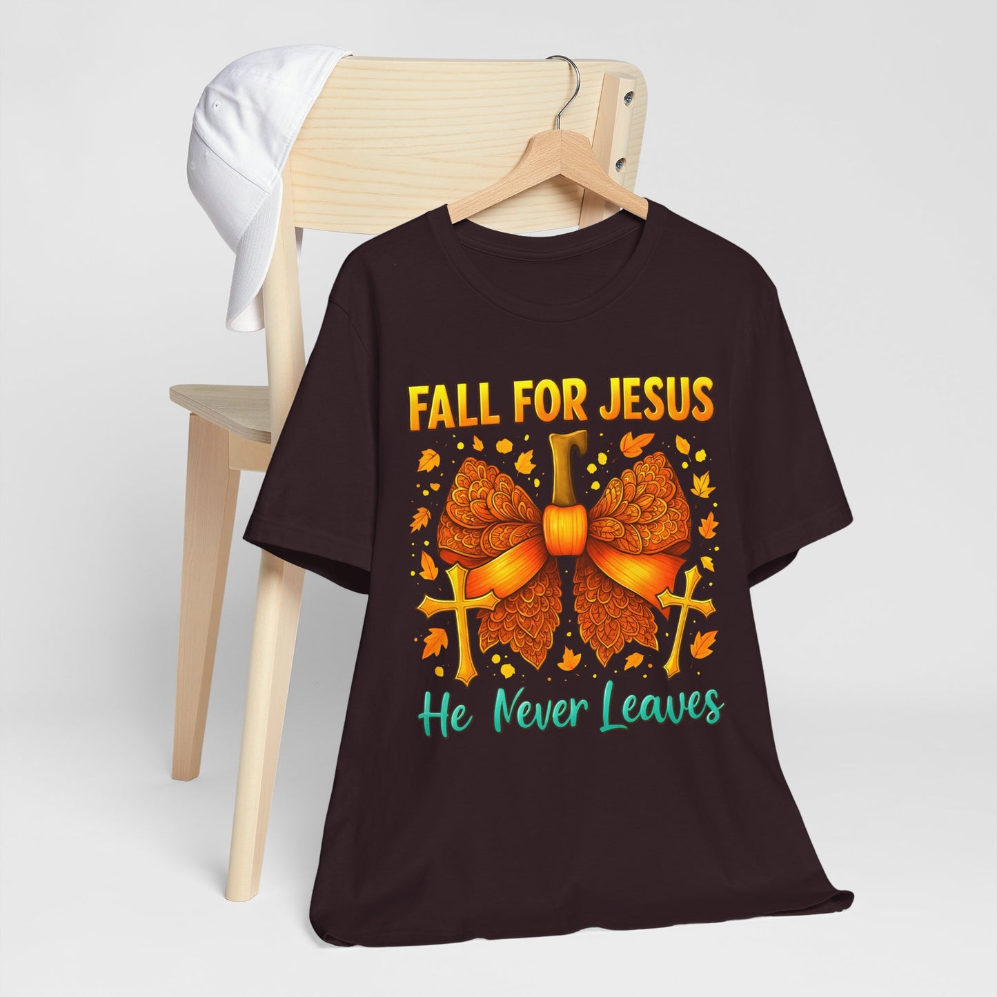 Fall for Jesus He Never Leaves Shirt – Christian Pumpkin Bow Thanksgiving Tee