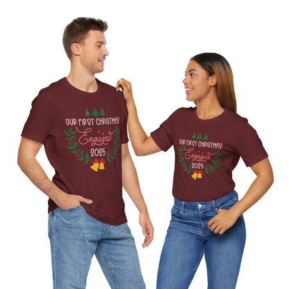 Our First Christmas Engaged 2025 Shirt – Holiday Couple Engagement Gift Tee