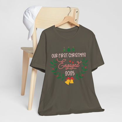 Our First Christmas Engaged 2025 Shirt – Holiday Couple Engagement Gift Tee