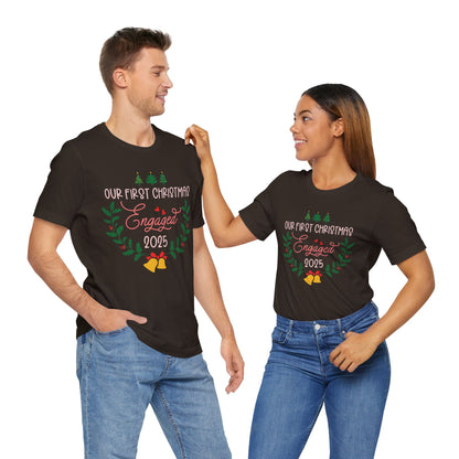 Our First Christmas Engaged 2025 Shirt – Holiday Couple Engagement Gift Tee