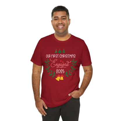 Our First Christmas Engaged 2025 Shirt – Holiday Couple Engagement Gift Tee