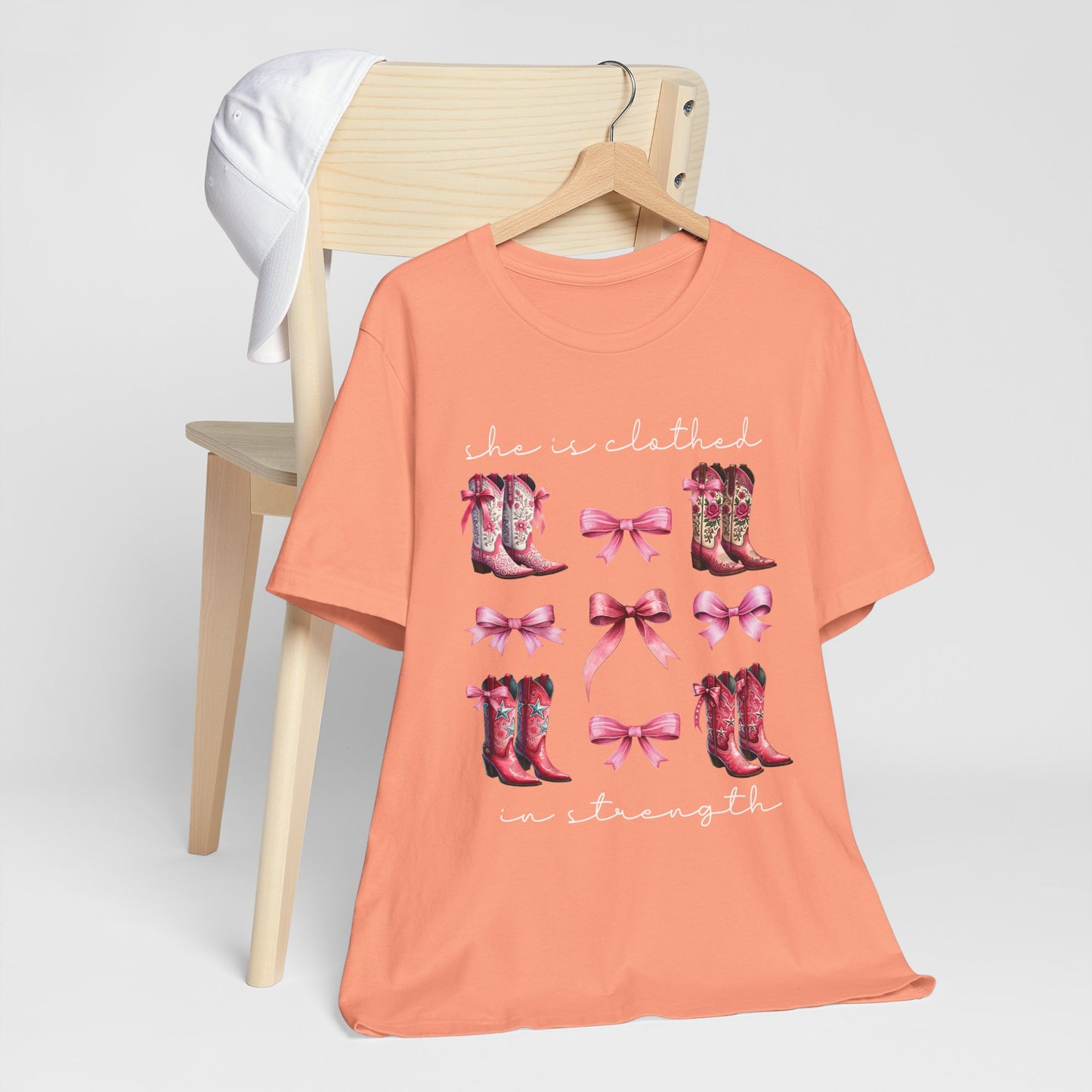 She Is Clothed in Strength Shirt – Western Boots Coquette Christian Tee